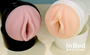 Pink generic Fleshlight sleeve in a black case, Girls series Stoya in a pearl white case